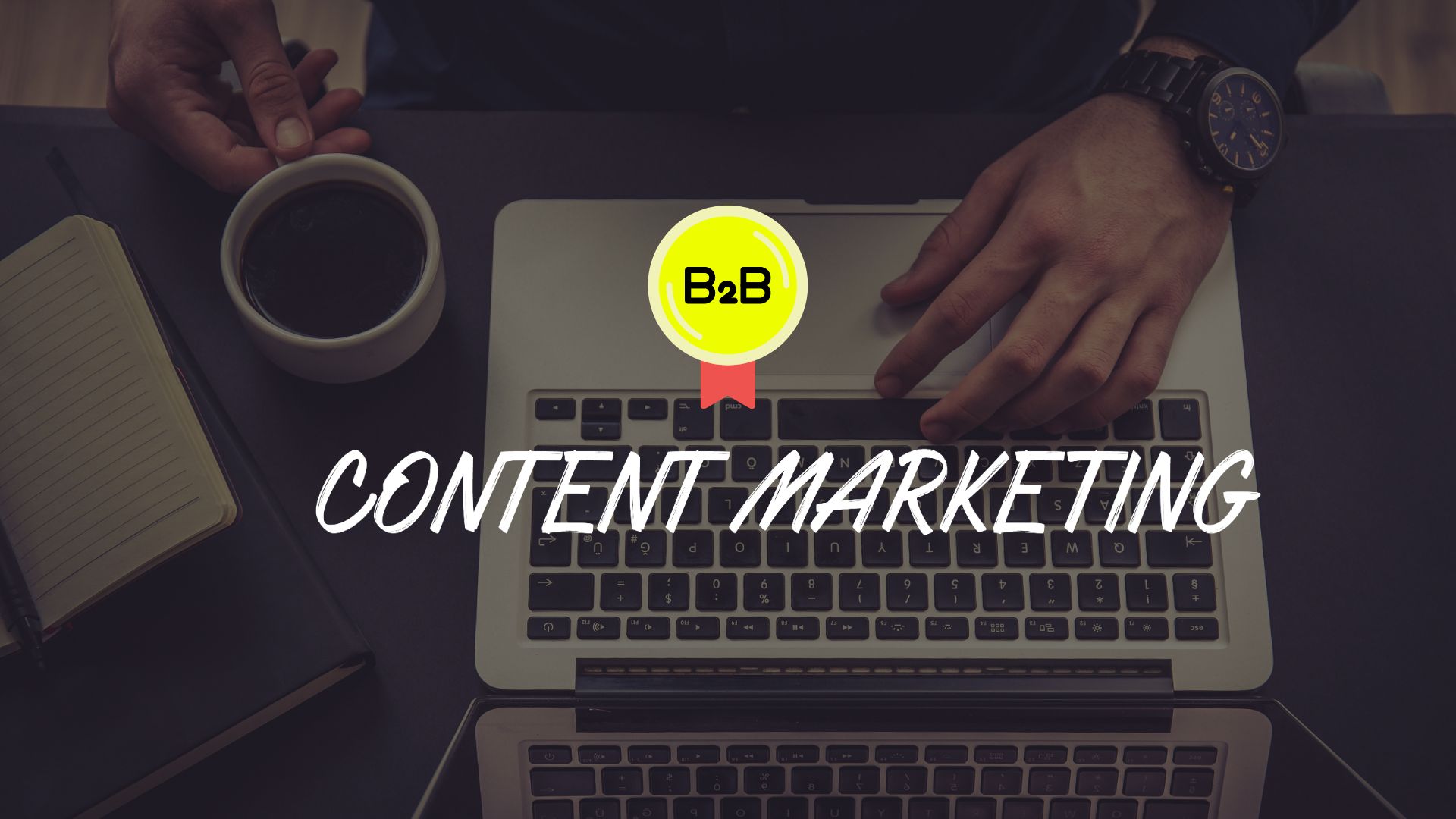 Image of hands on laptop keyboard with "B2B Content Marketing" written on it