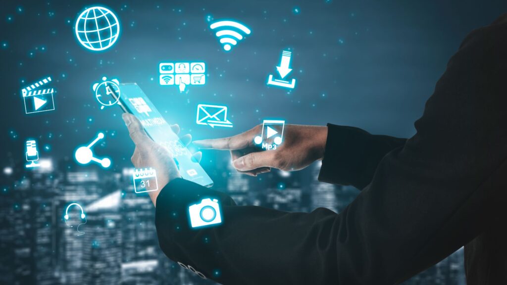 Person holding smartphone with multimedia content symbols hovering above the screen.