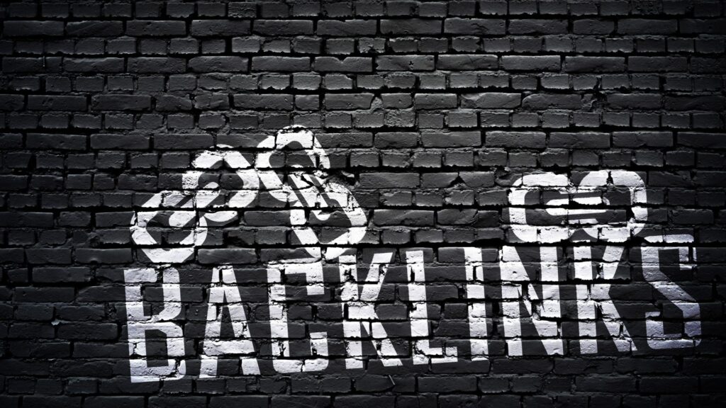 Black brick wall with "backlinks" written on it in white