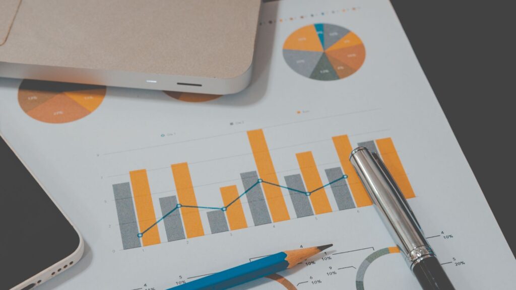 Piece of paper with graphs and tables showing content marketing stats.