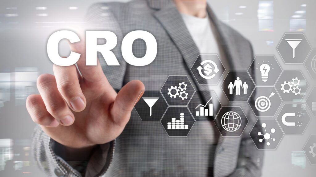 Man pointing finger on the word "CRO".