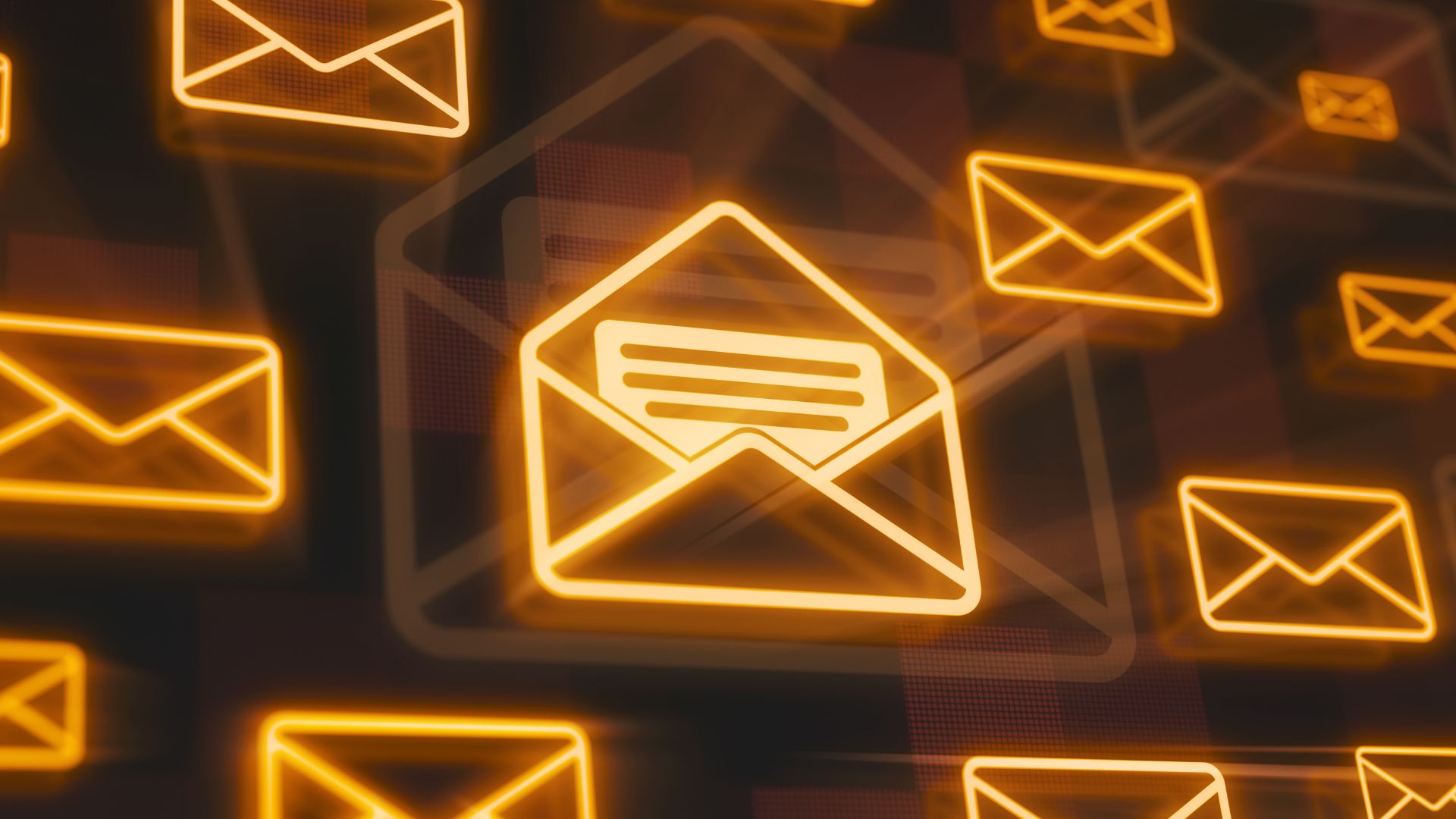 Golden email symbols on black background.