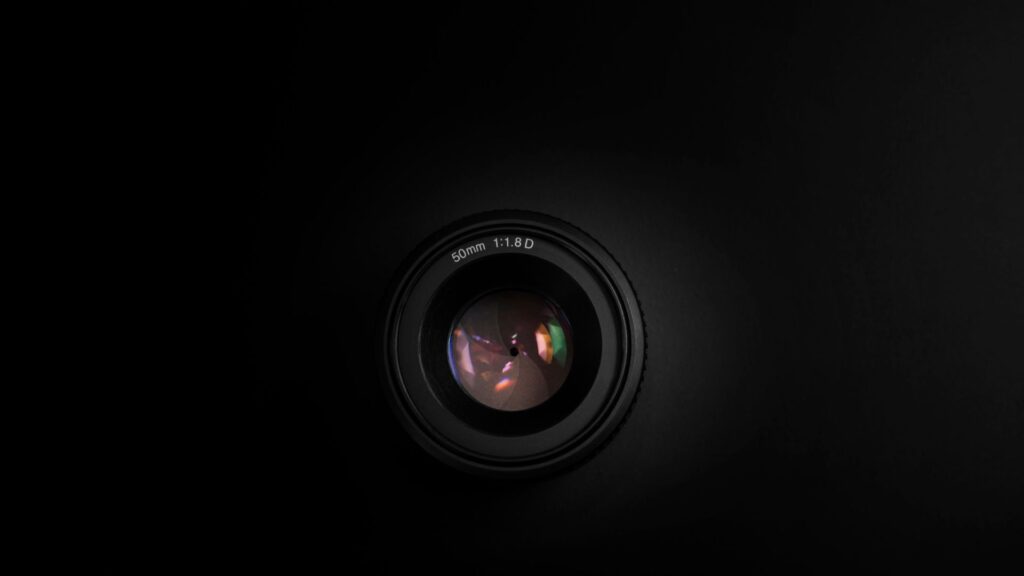 Camera lens on a black background.