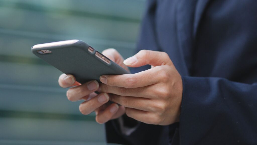 Hands holding a smartphone