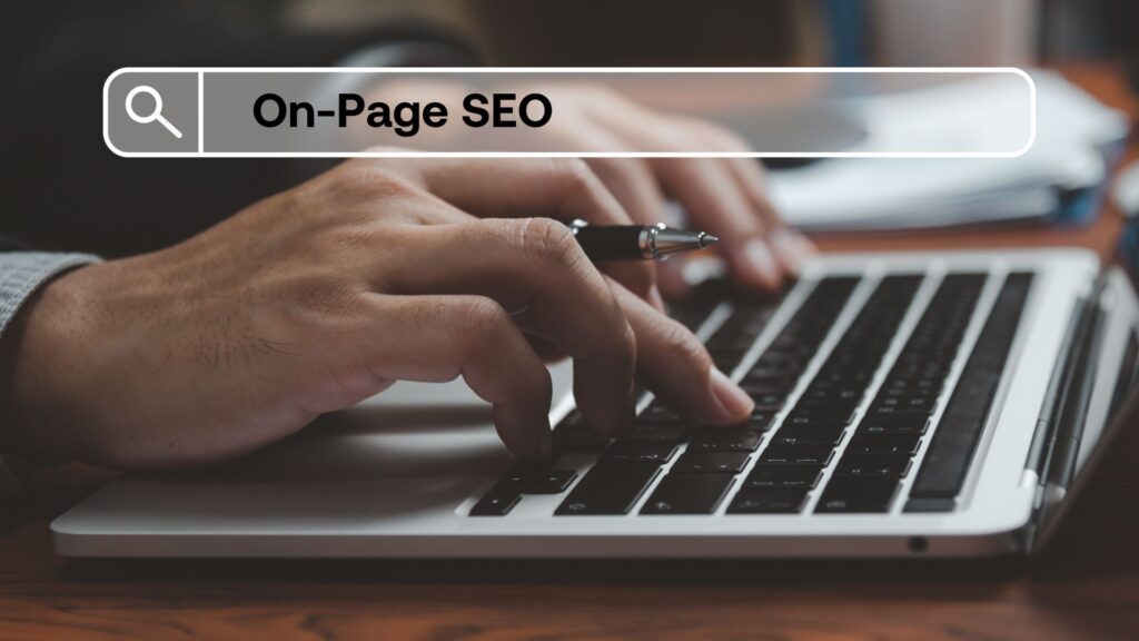 Hands typing on a laptop keyboard and a search bar with "On-Page SEO" written in it.