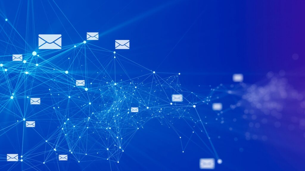 Email symbols on blue background symbolizing outreach emails.