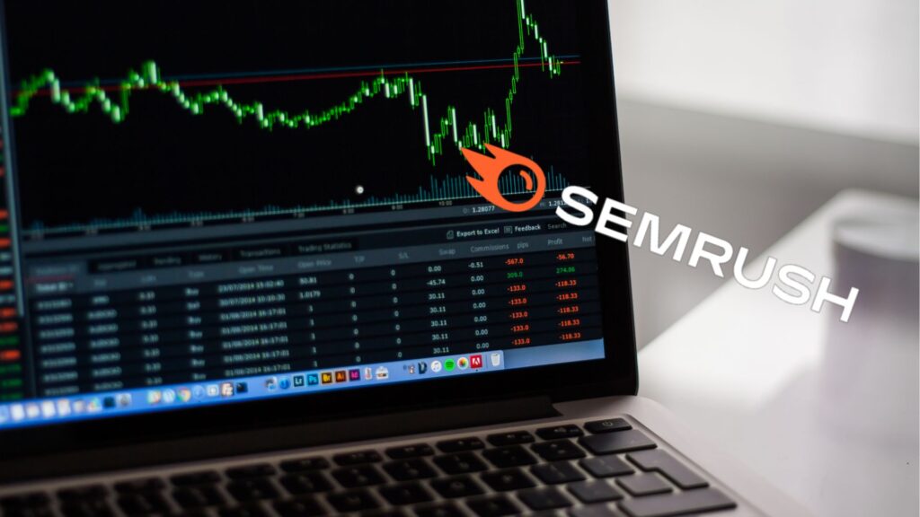 Laptop screen with graph on it next to a SEMrush logo.