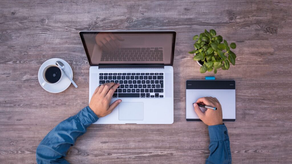 Person working on laptop.